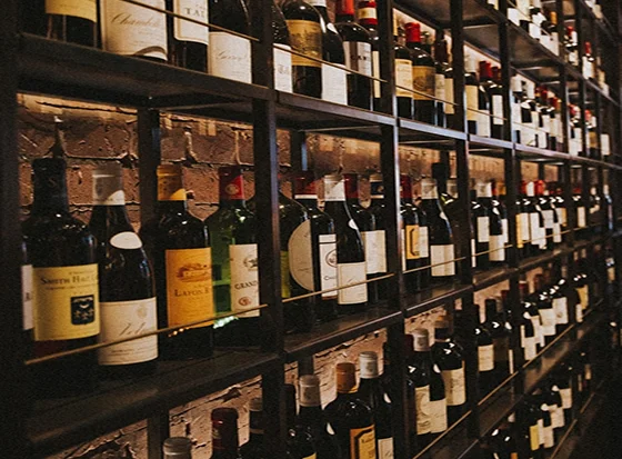 Wine bottles on shelves